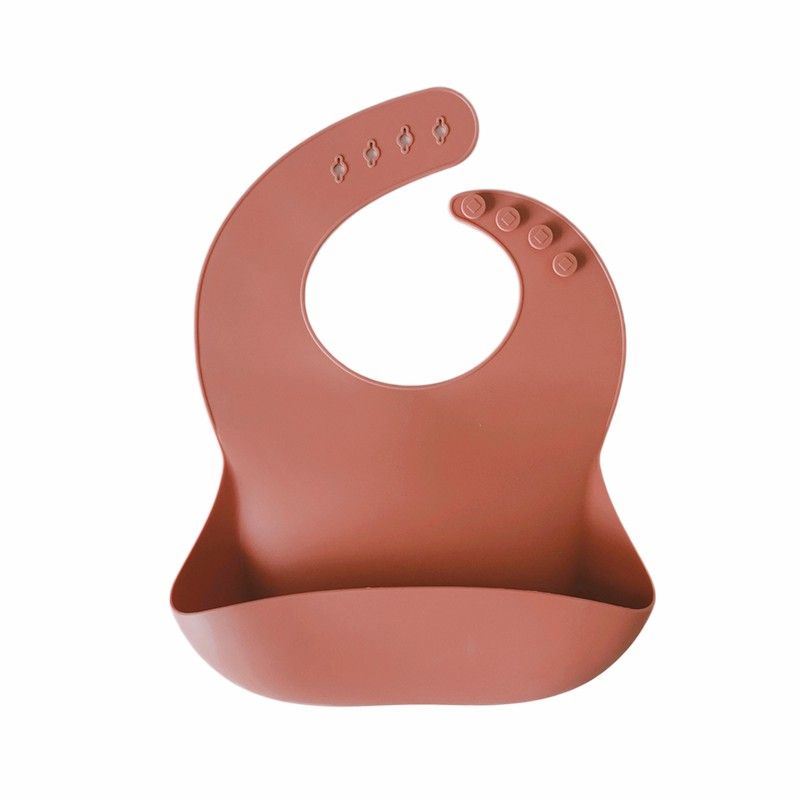 Babero silicona brick (terracota) Storki